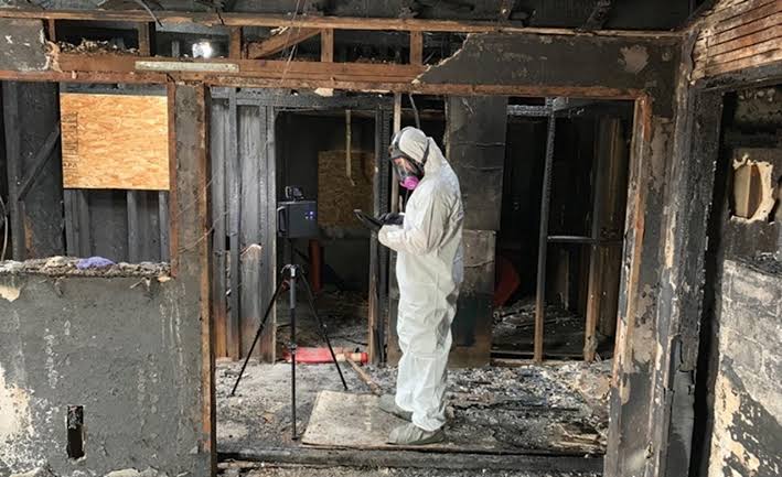 fire damage restoration air scrubber removing smoke odor