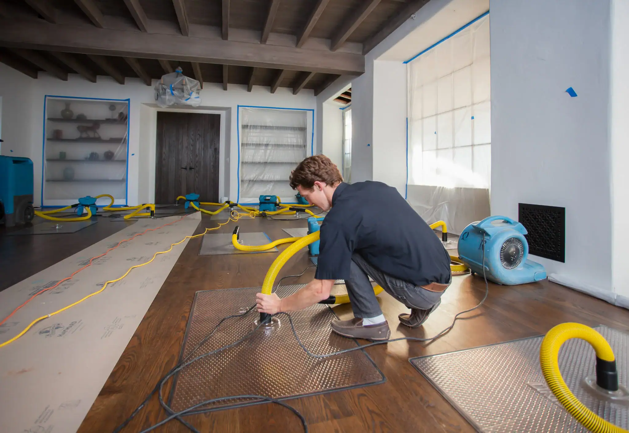 water damage restoration cost homeowner reviewing written quote